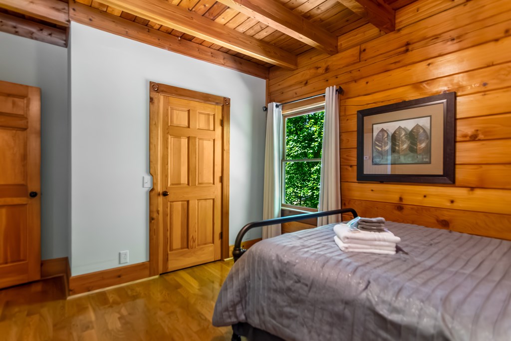 22 Waterloon Trail Morganton, GA 30560 - Photo 58 of 71 a bedroom with a bed and a window