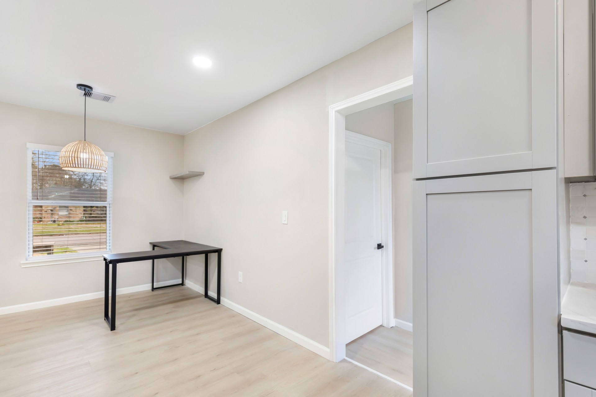 4231 Hartsville Road Houston, TX 77047 - Photo 12 of 23 a view of a room with a window and a ceiling fan