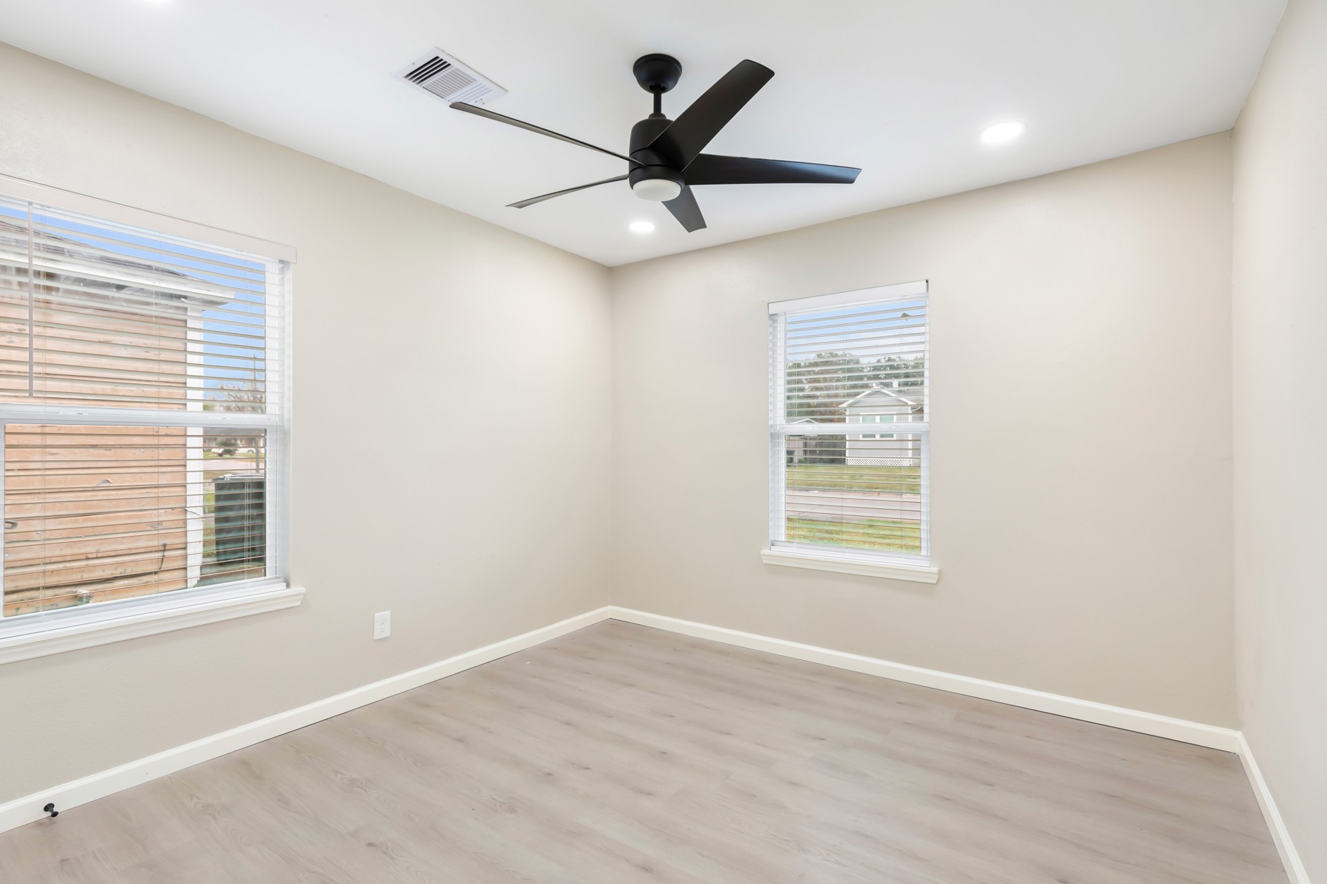 4231 Hartsville Road Houston, TX 77047 - Photo 14 of 23 a view of an empty room with a window