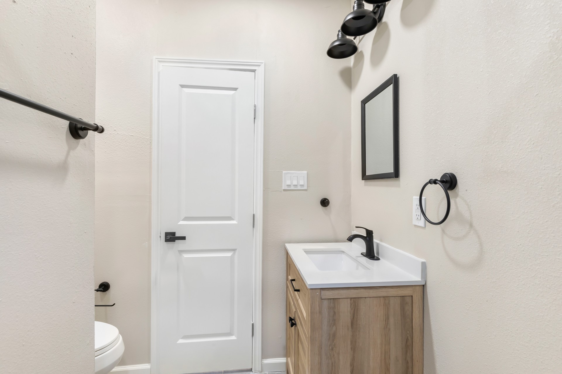 4231 Hartsville Road Houston, TX 77047 - Photo 15 of 23 a bathroom with a sink a toilet and shower