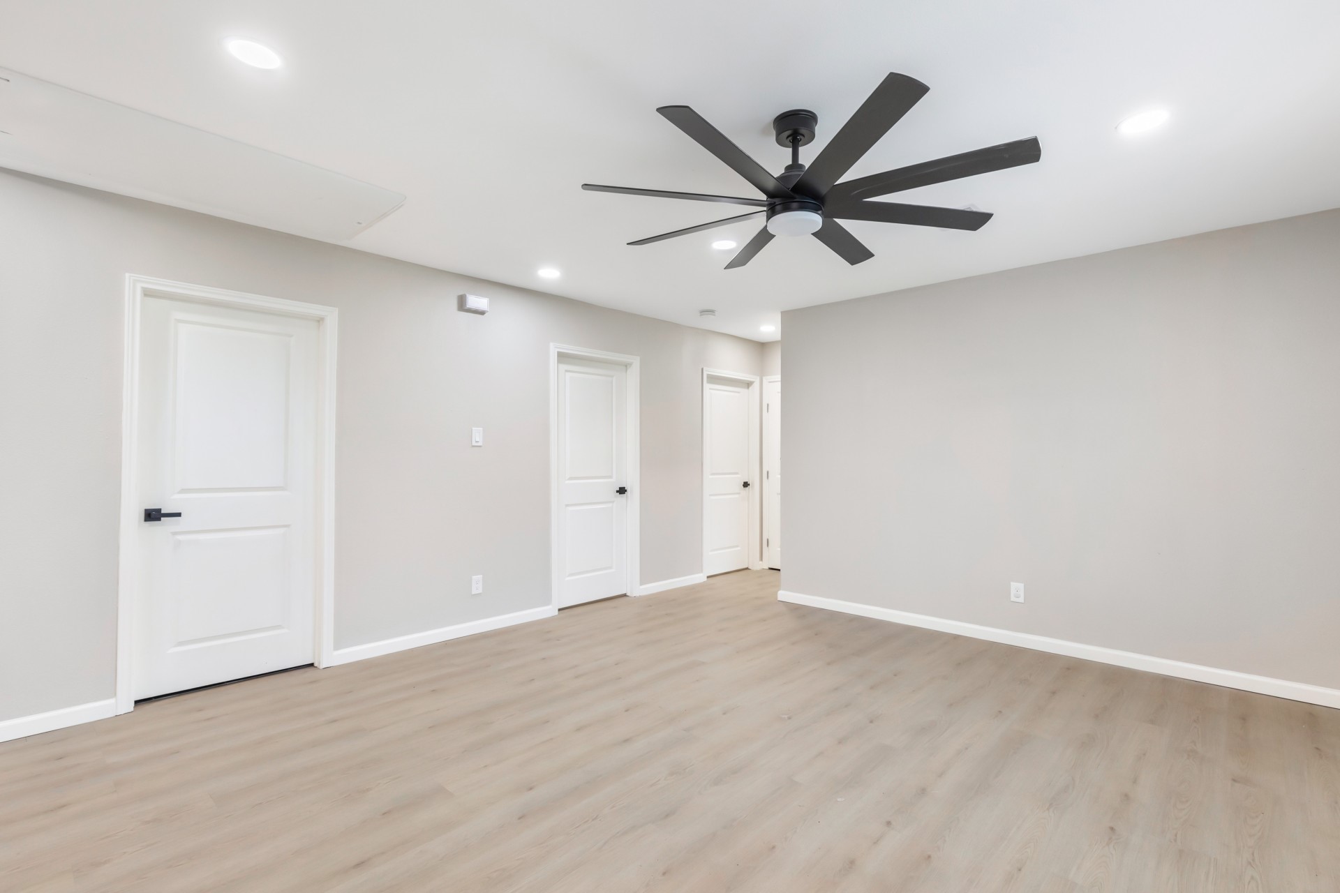 4231 Hartsville Road Houston, TX 77047 - Photo 18 of 23 a view of a big room with wooden floor closet and windows in a room