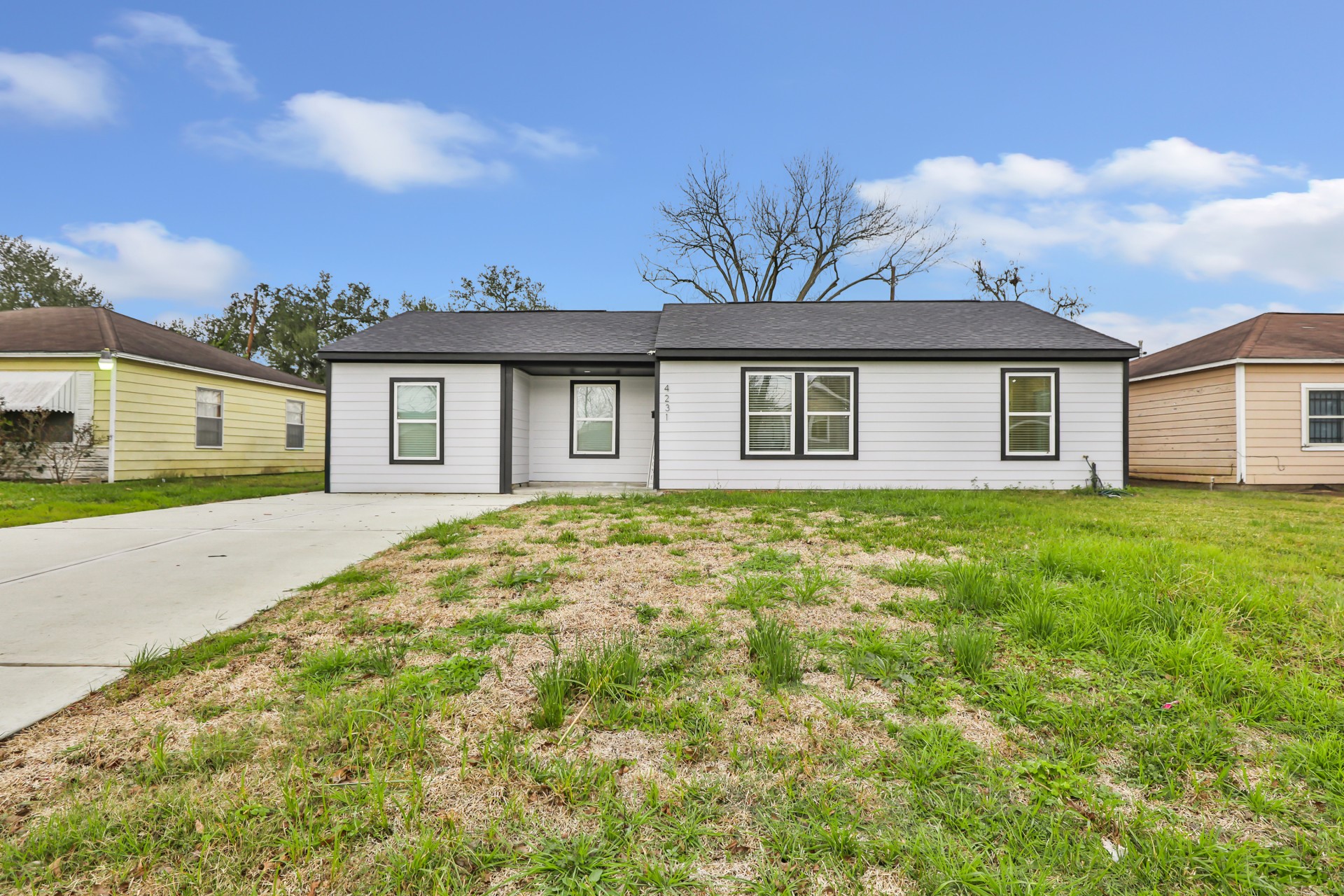 4231 Hartsville Road Houston, TX 77047 - Photo 2 of 23 a view of a house with a backyard