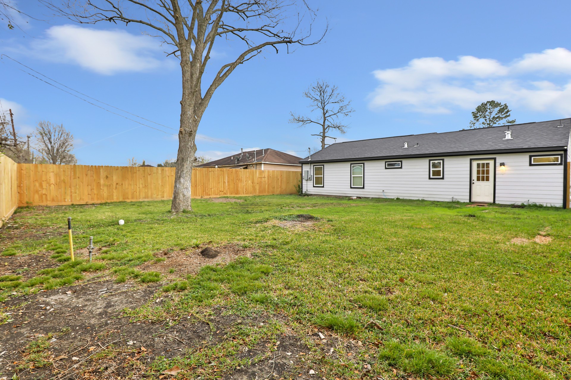 4231 Hartsville Road Houston, TX 77047 - Photo 23 of 23 a view of a house with a yard