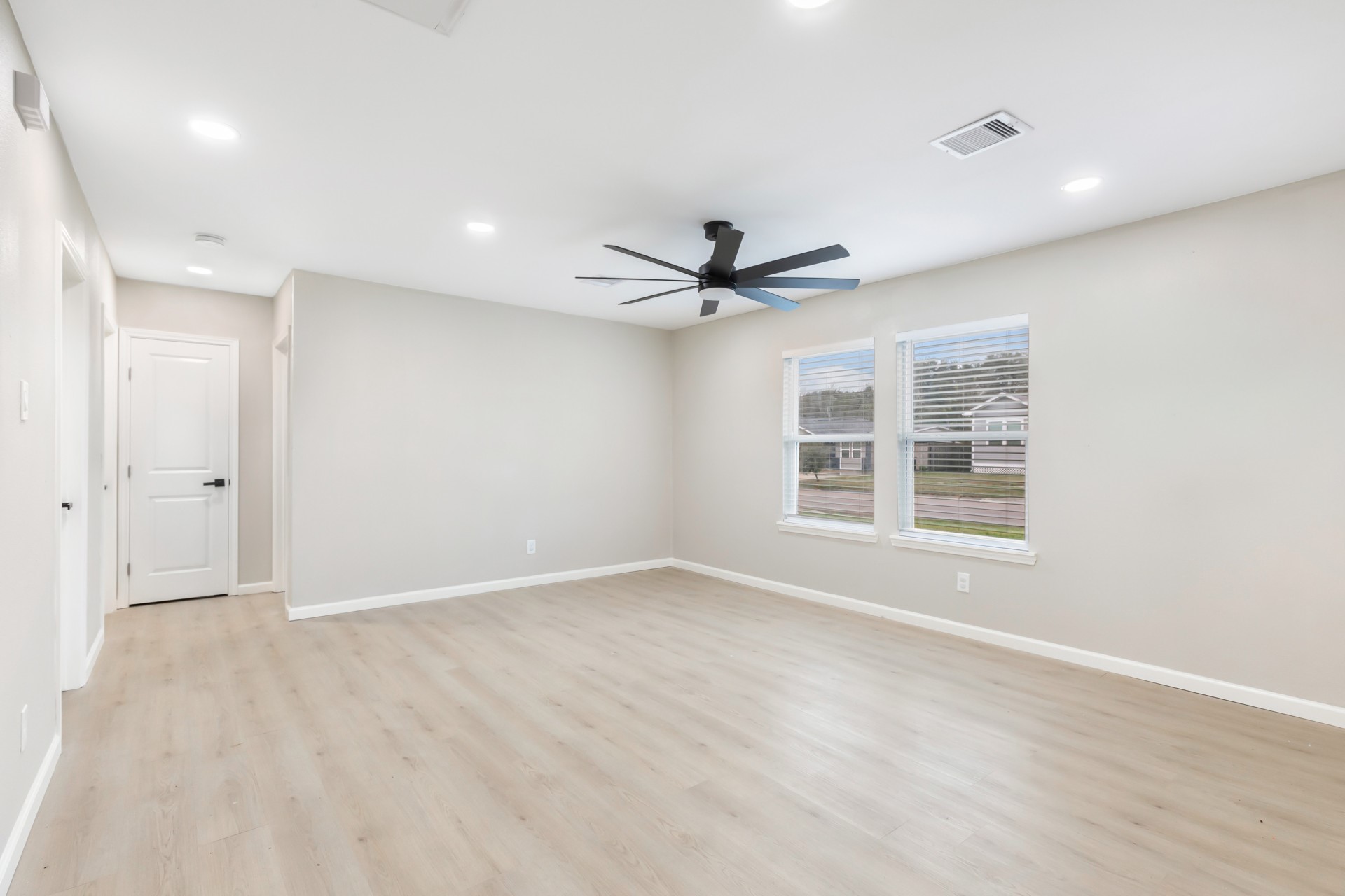 4231 Hartsville Road Houston, TX 77047 - Photo 9 of 23 a view of an empty room with a window