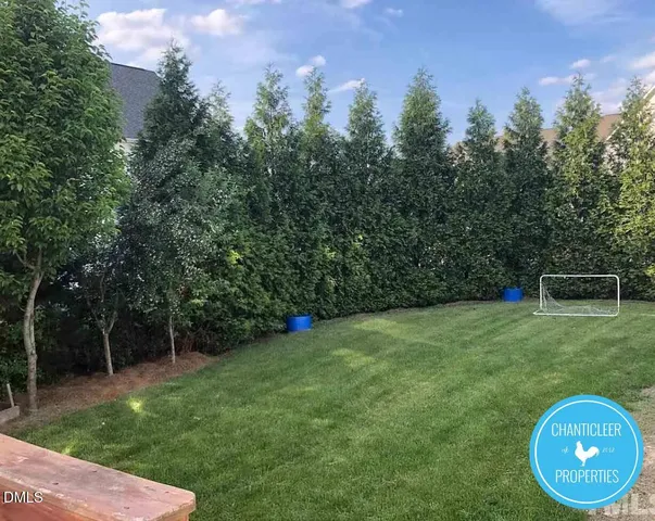 a view of a backyard with a garden