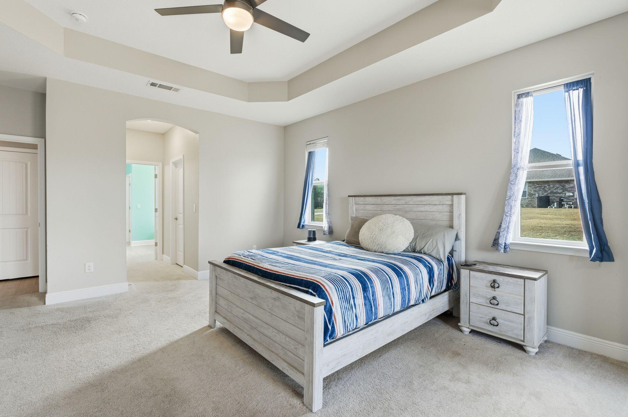 334 Tournament Lane Freeport, FL 32439 - Photo 15 of 27 a bedroom with a bed and a window