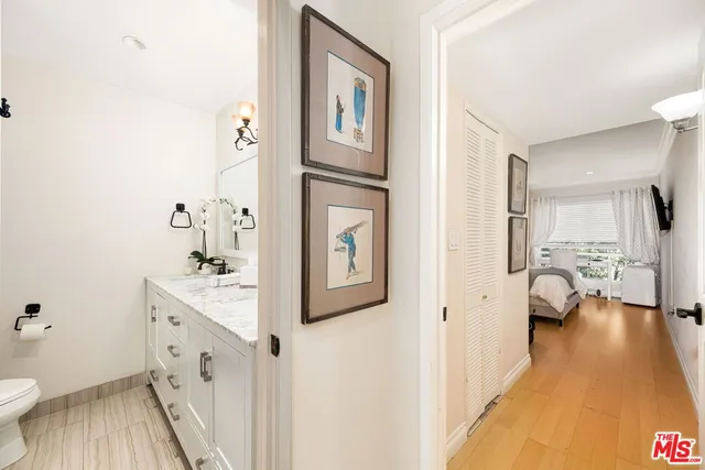 a bedroom with a bed and a stove