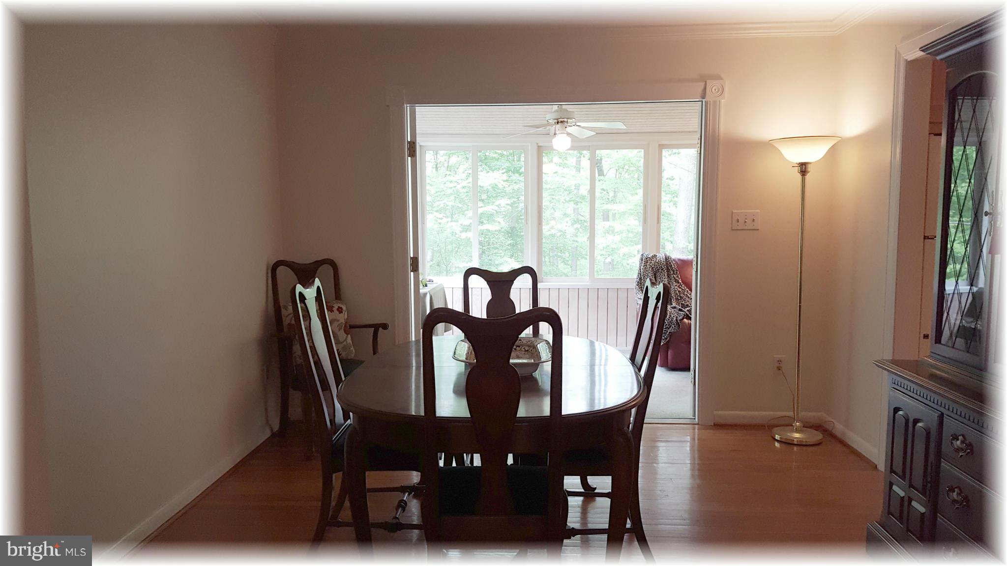 12009 Caspian Road Kingsville, MD 21087 - Photo 14 of 30 Din. rm. w/hardwood leads to your sunroom addition