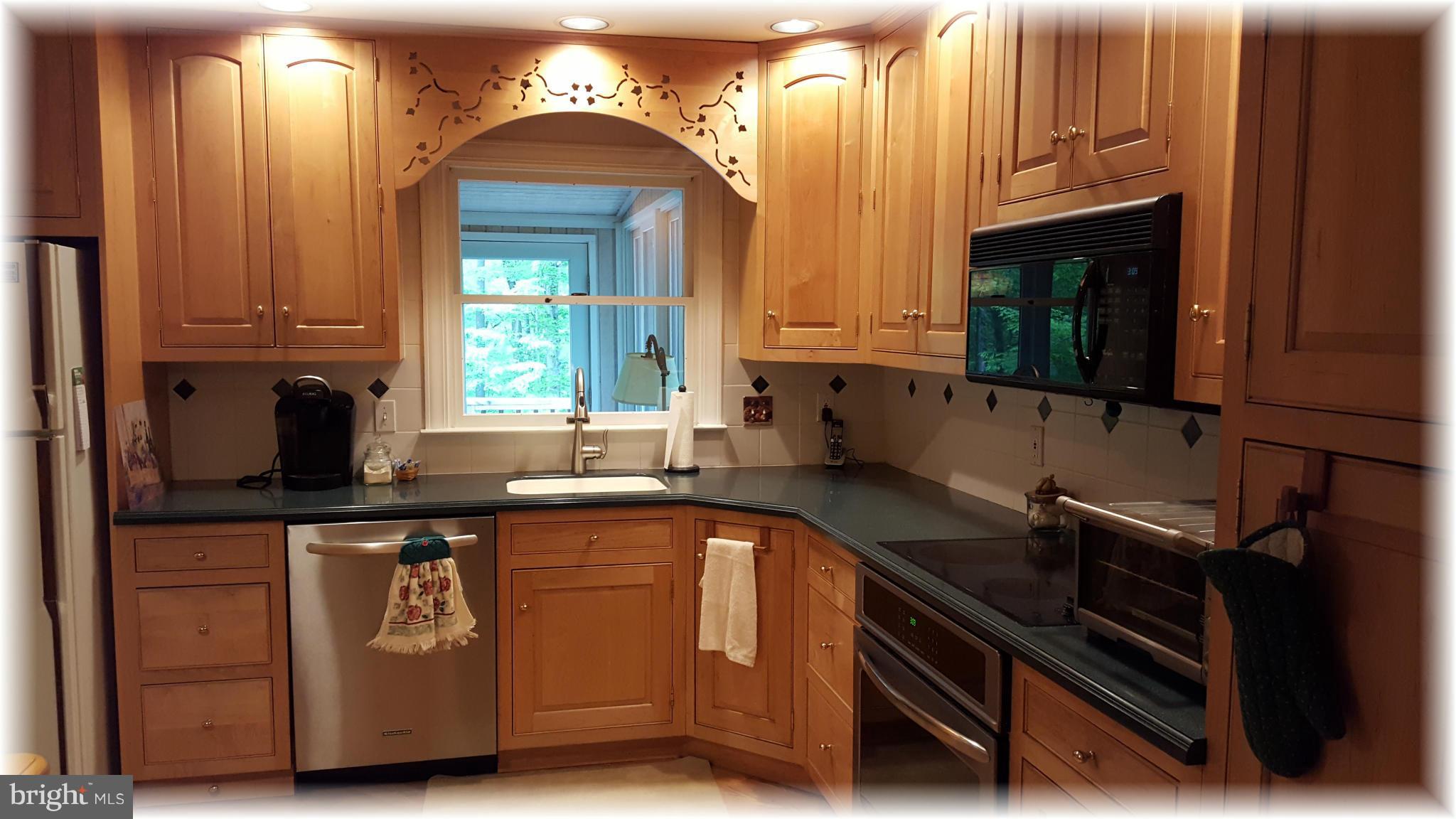 12009 Caspian Road Kingsville, MD 21087 - Photo 16 of 30 Updated kitchen offers natural maple cabinetry.