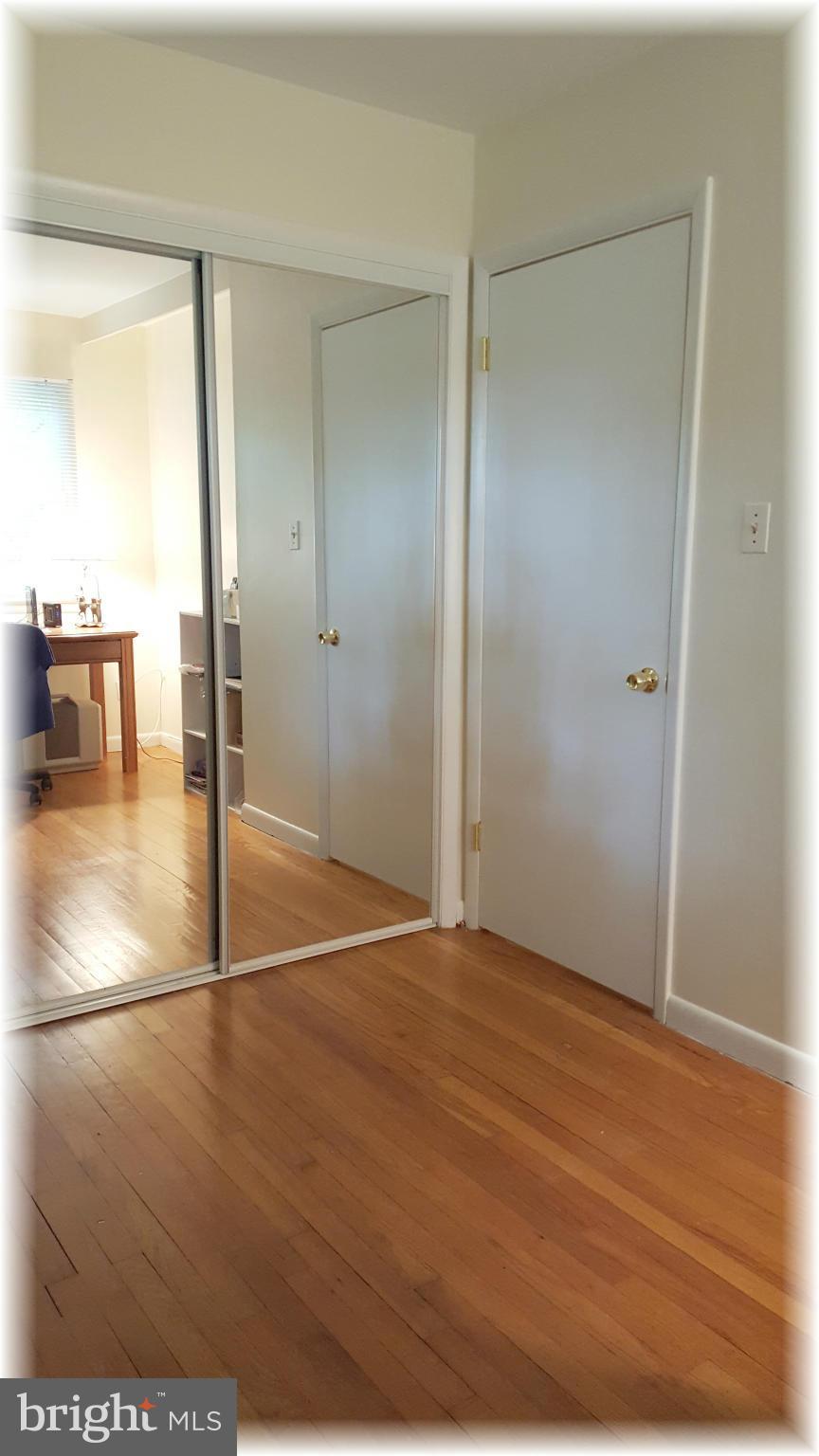 12009 Caspian Road Kingsville, MD 21087 - Photo 23 of 30 All BRs offers hardwood & mirrored closet doors.