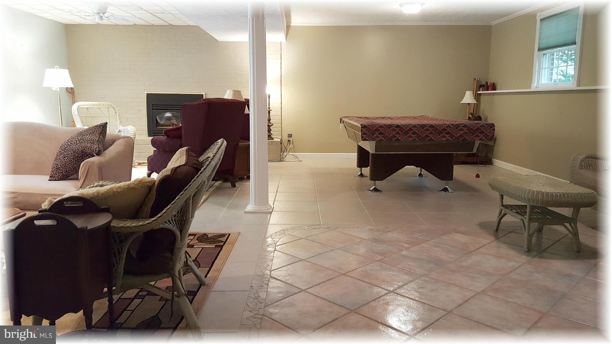 12009 Caspian Road Kingsville, MD 21087 - Photo 25 of 30 Spacious fam. rm. offers ceramic flooring & more.