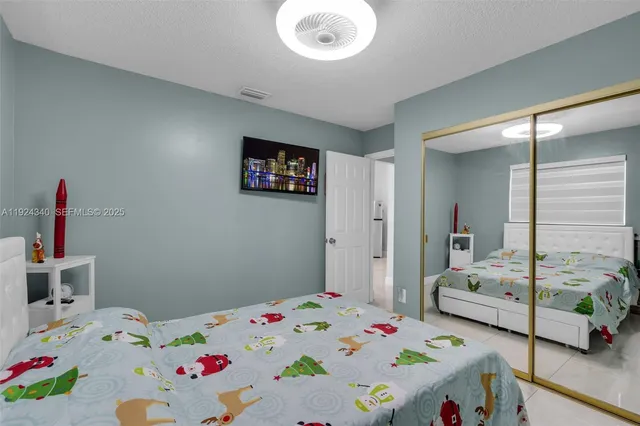a bedroom with baby bed and two room