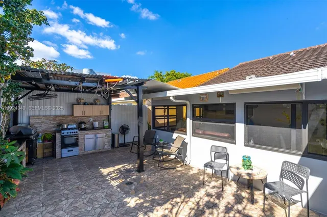 a view of a house with a patio
