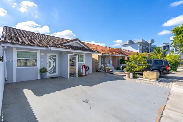 a view of a house with patio