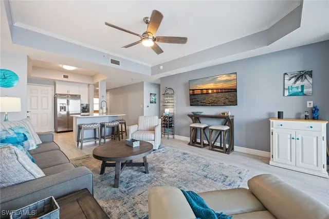 a balcony with table and chairs