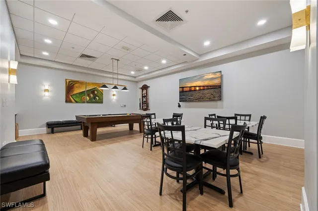a bathroom with a window and a shower