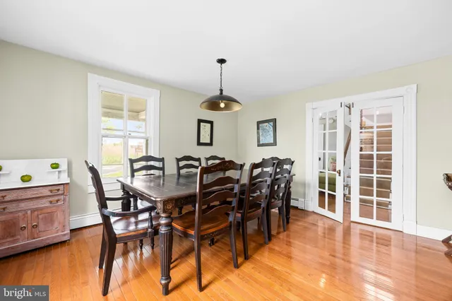 a kitchen with stainless steel appliances a stove a sink and a microwave