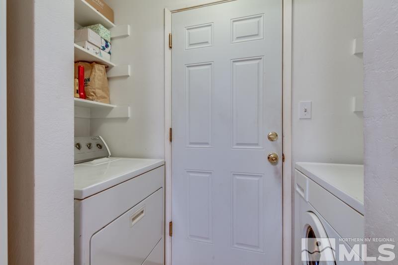 4375 Valdez Way Reno, NV 89502 - Photo 6 of 22 a bathroom with a sink a toilet and shower