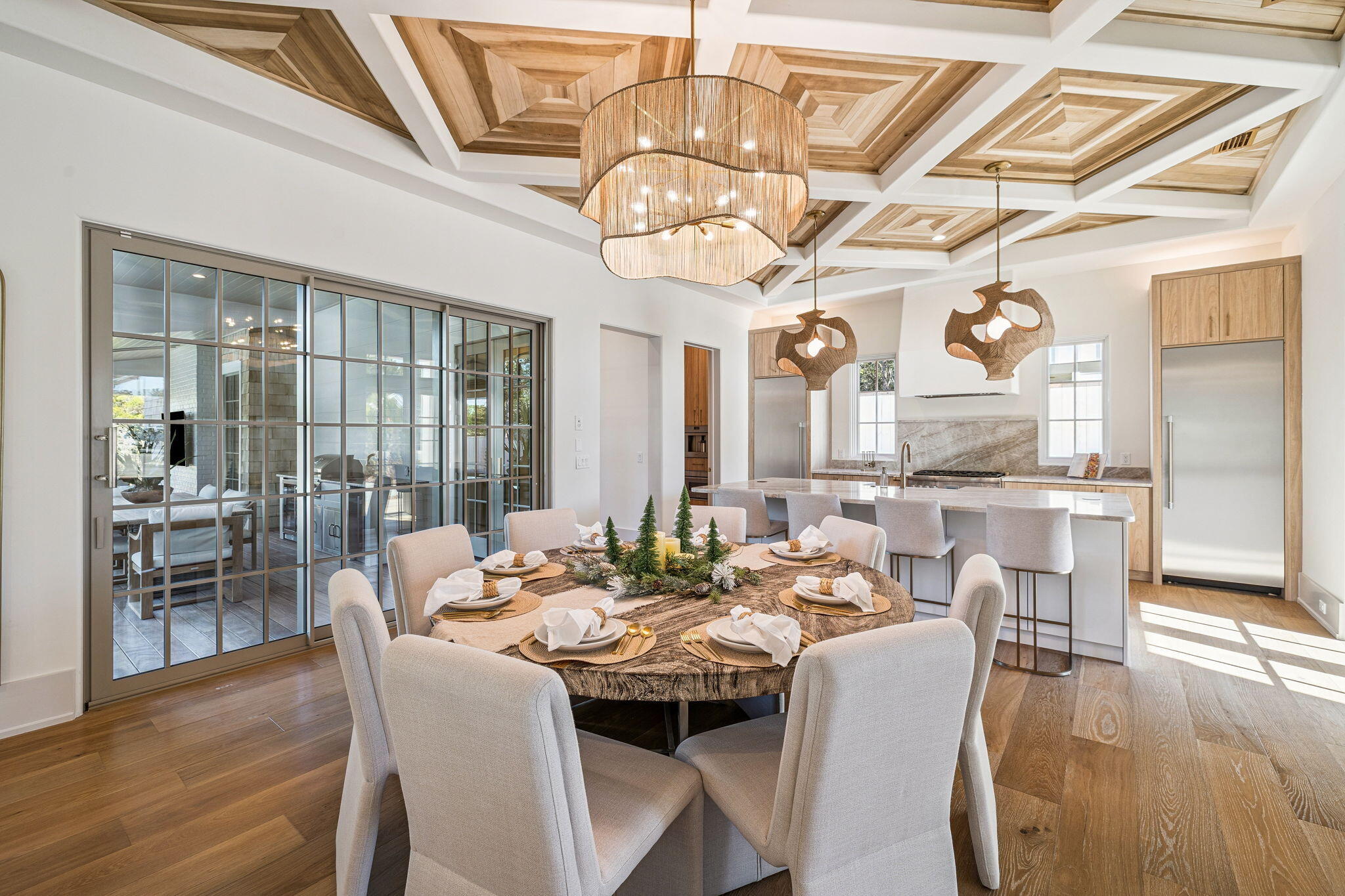 107 Pine Cone Trail Inlet Beach, FL 32461 - Photo 21 of 66 a view of a dining room with furniture wooden floor and chandelier