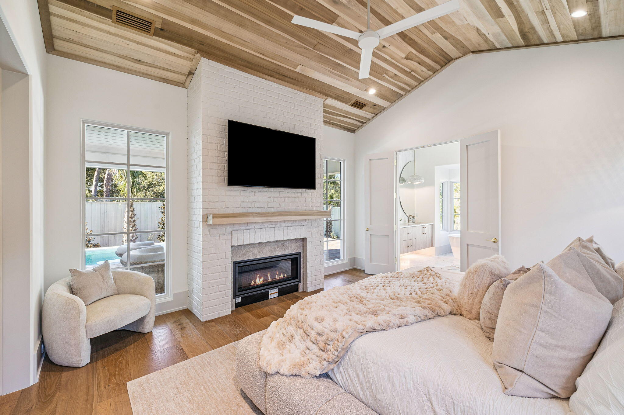 107 Pine Cone Trail Inlet Beach, FL 32461 - Photo 29 of 66 a living room with furniture a fireplace and a flat screen tv