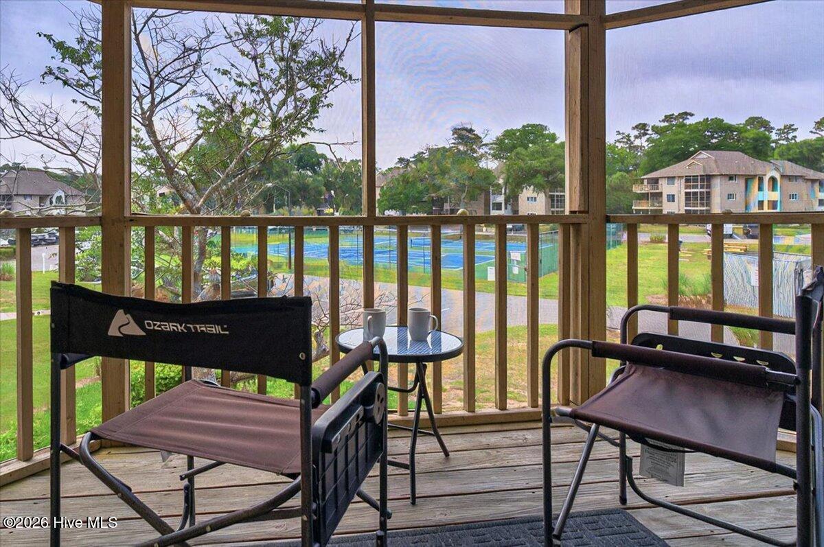 816 Colony Place Southwest, Unit D Sunset Beach, NC 28468 - Photo 29 of 55 Private Screened Porch