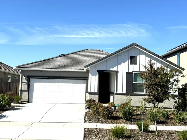 a house view with a outdoor space