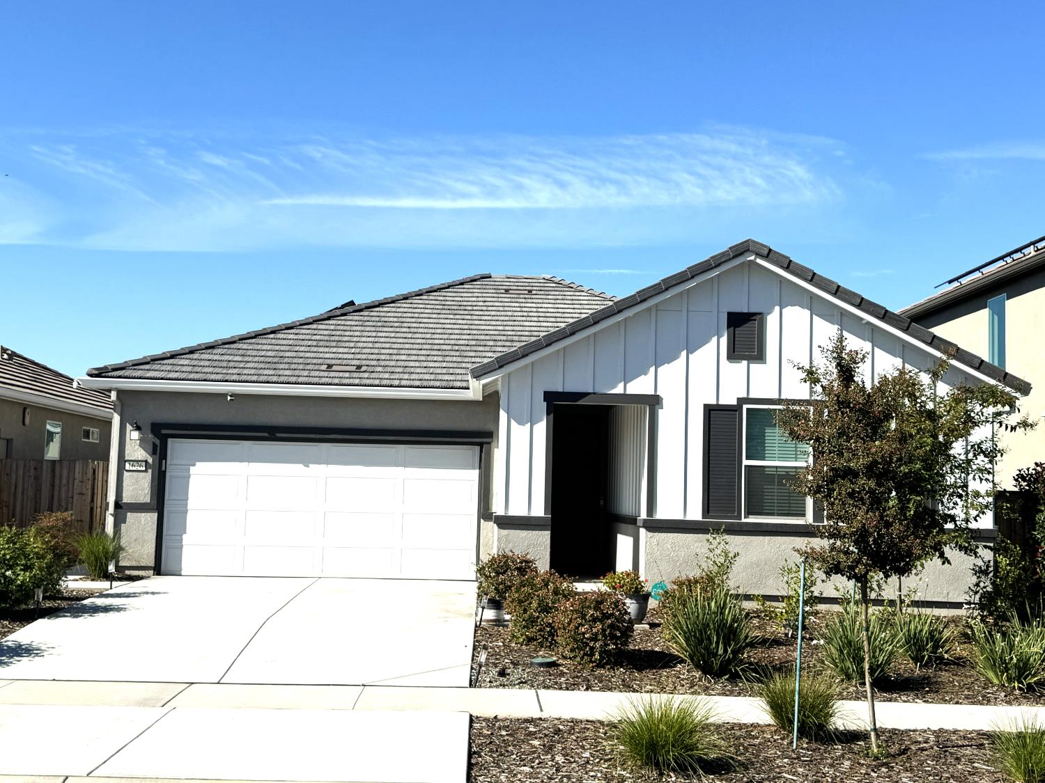 a house view with a outdoor space