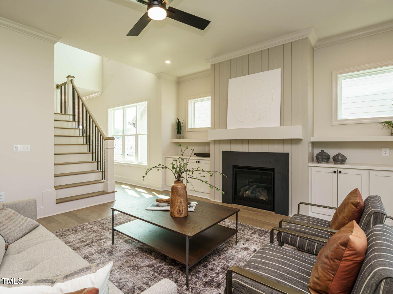 1528 Level Stream Road Wendell, NC 27591 - Photo 13 of 46 a living room with furniture and a fireplace