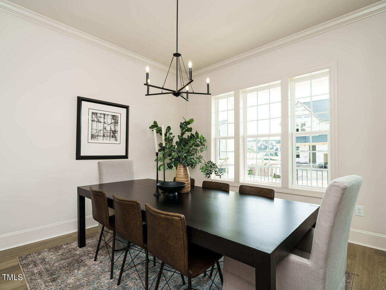 1528 Level Stream Road Wendell, NC 27591 - Photo 5 of 46 a view of a dining room with furniture window and wooden floor