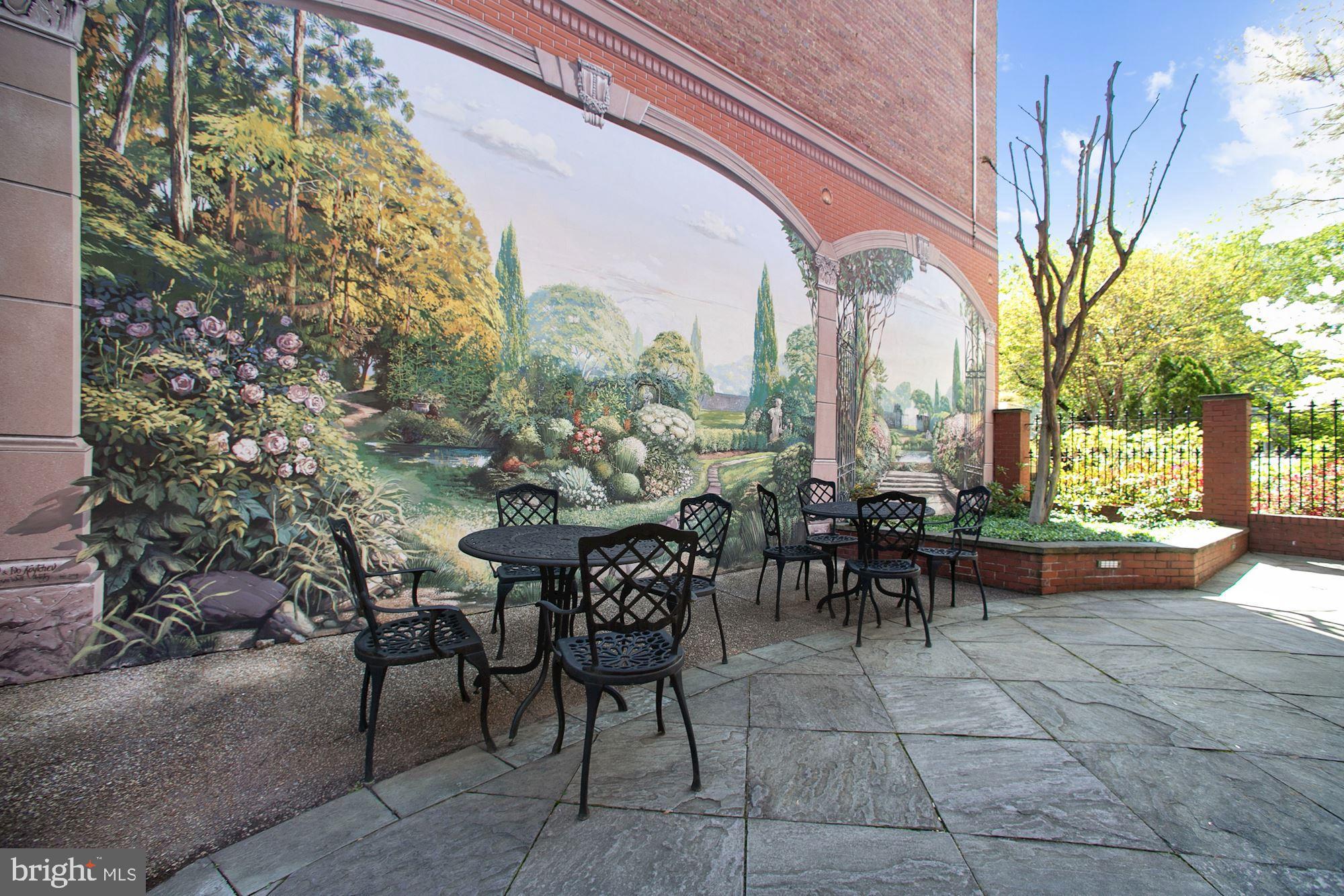 712 East Capitol Street Northeast Washington, DC 20003 - Photo 9 of 79 Custom mural lends a Tuscan air to the courtyard