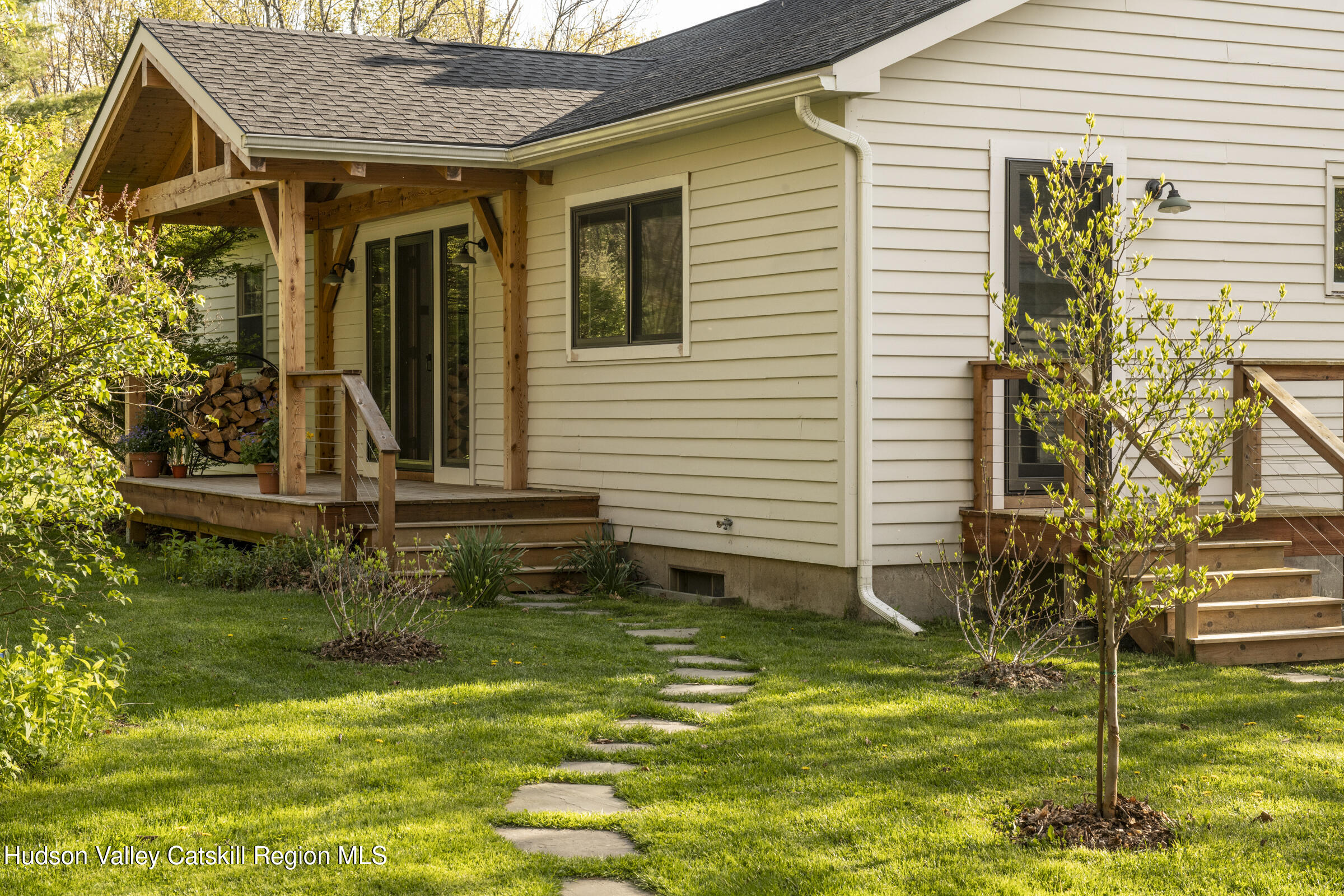 61 Schoolhouse Road New Lebanon, NY 12125 - Photo 1 of 22 a view of a house with a backyard