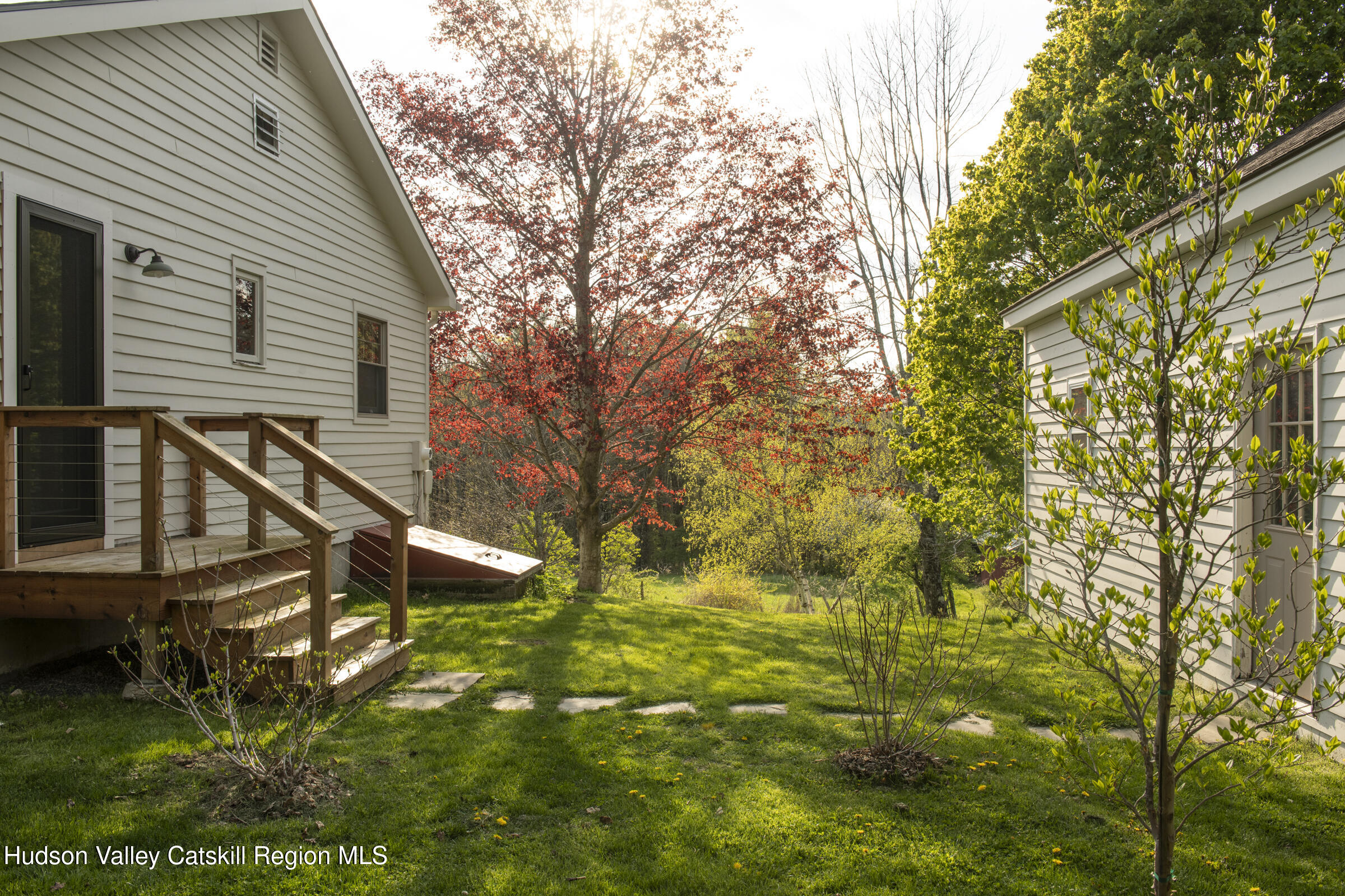 61 Schoolhouse Road New Lebanon, NY 12125 - Photo 11 of 22 a backyard of a house with lots of green space