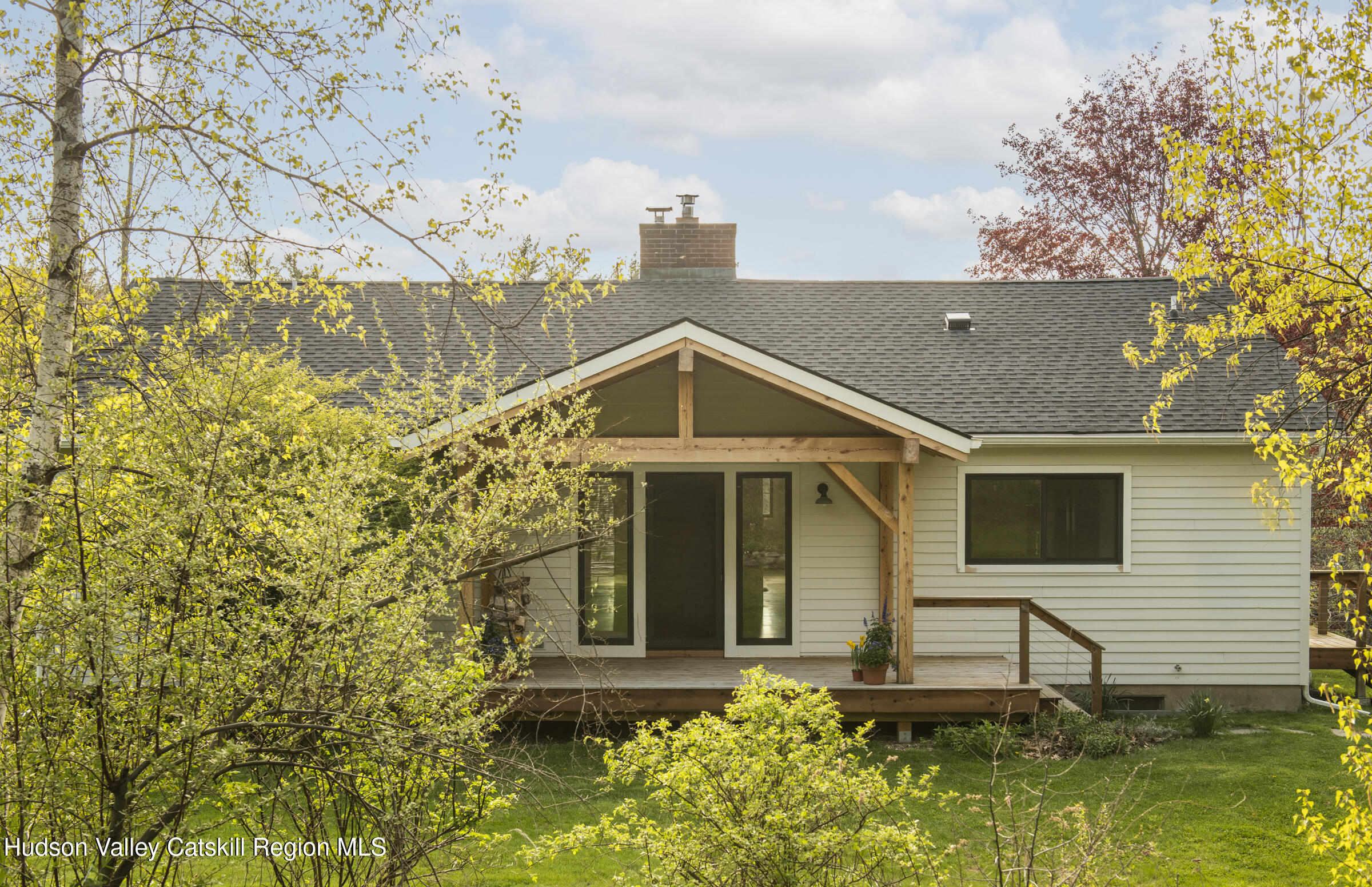 61 Schoolhouse Road New Lebanon, NY 12125 - Photo 14 of 22 a front view of a house with garden