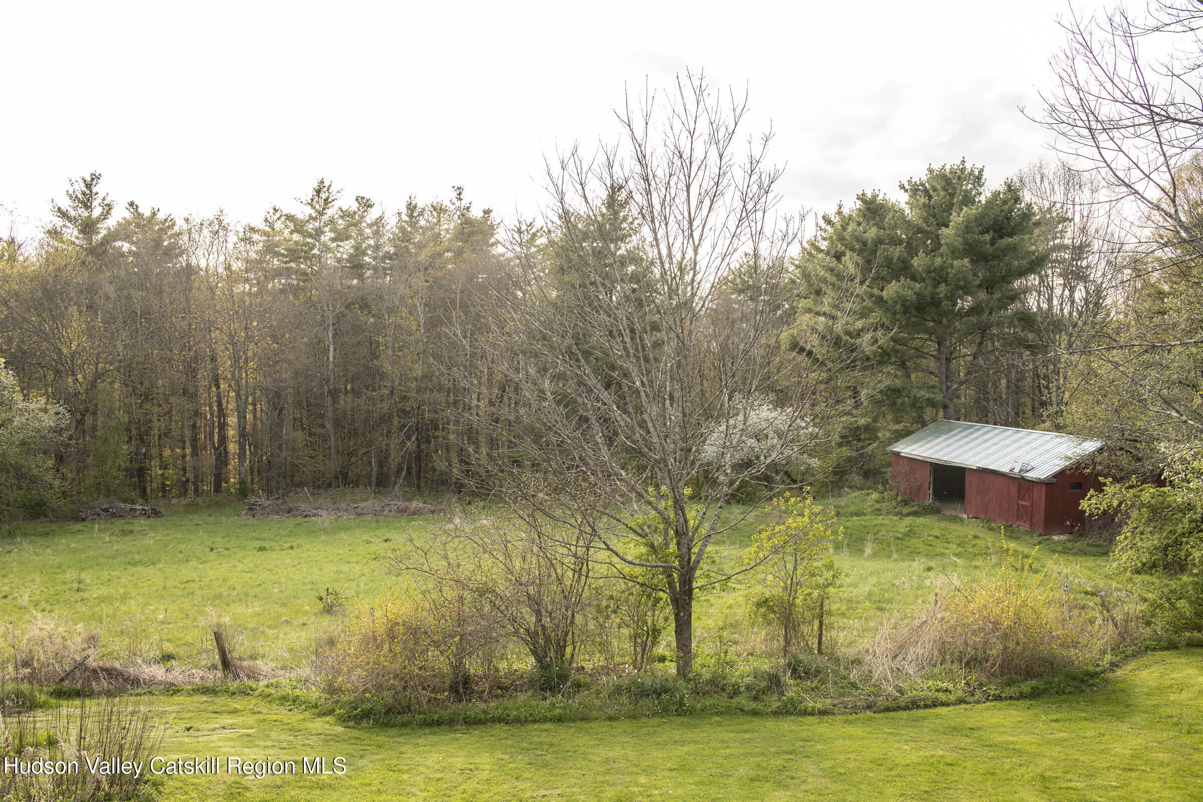 61 Schoolhouse Road New Lebanon, NY 12125 - Photo 15 of 22 a view of a swimming pool with a yard