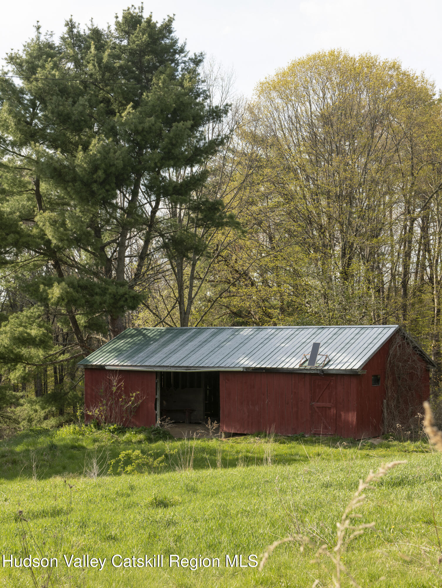 61 Schoolhouse Road New Lebanon, NY 12125 - Photo 16 of 22 a backyard of a house with lots of green space