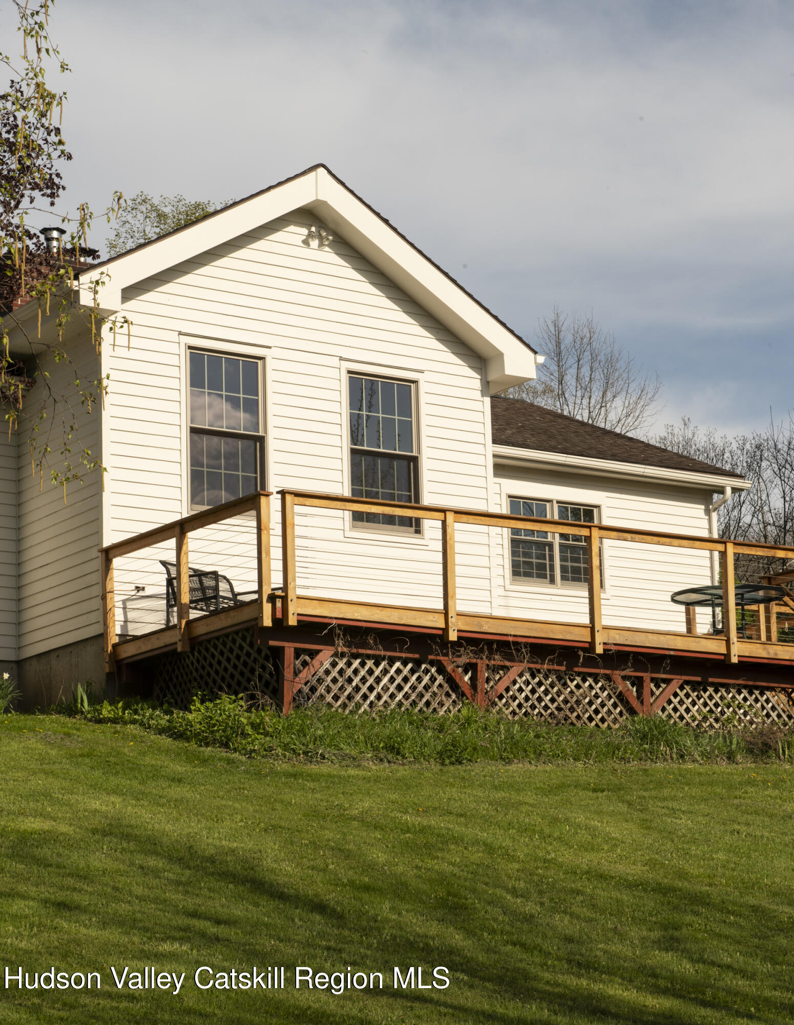 61 Schoolhouse Road New Lebanon, NY 12125 - Photo 20 of 22 a front view of a house with a garden