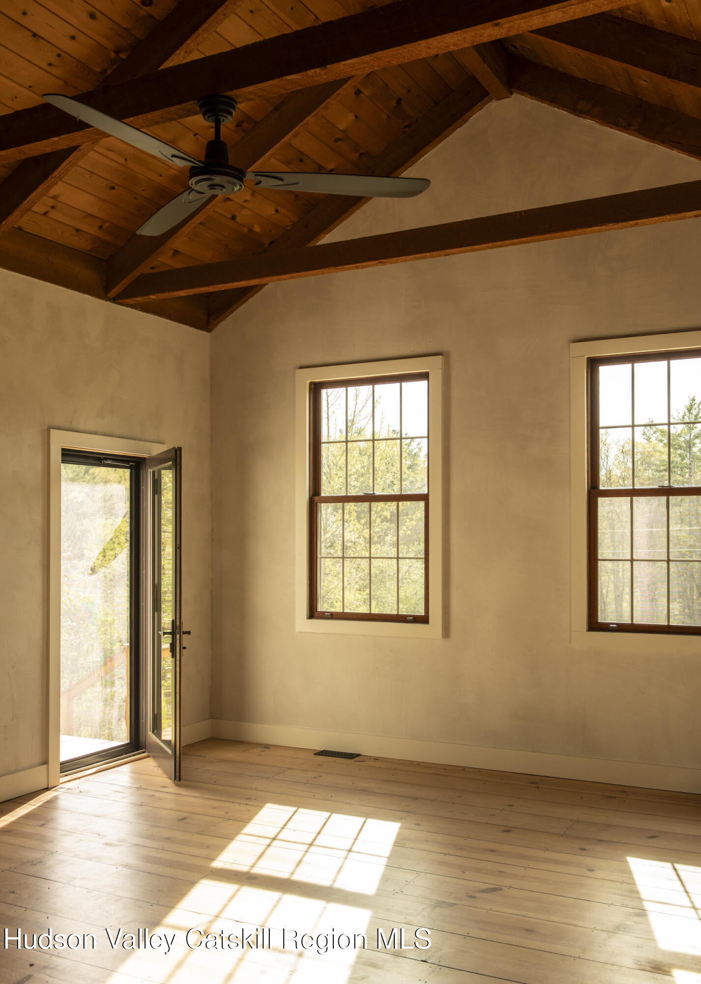 61 Schoolhouse Road New Lebanon, NY 12125 - Photo 4 of 22 a view of an empty room with a window