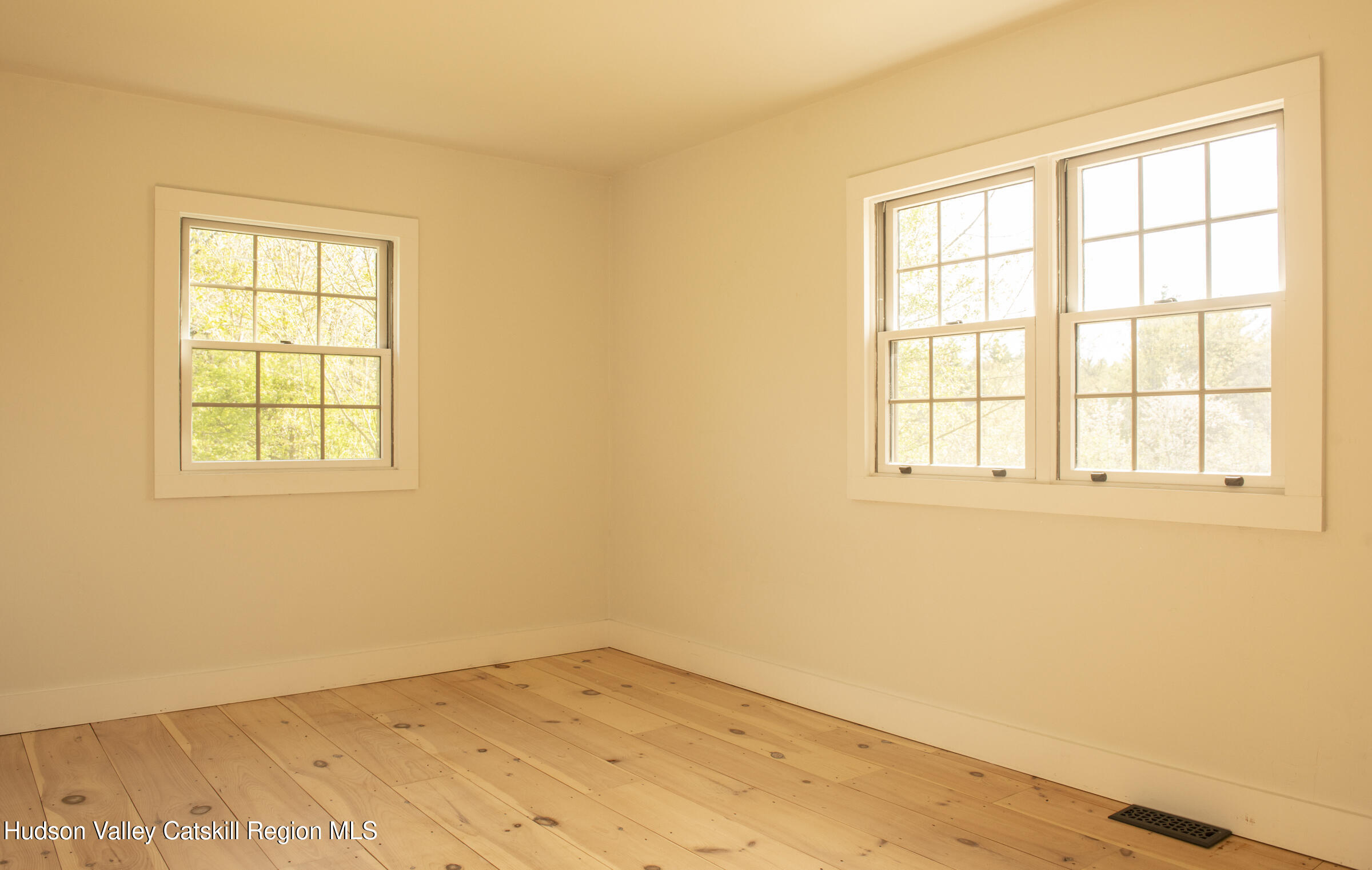 61 Schoolhouse Road New Lebanon, NY 12125 - Photo 6 of 22 an empty room with a window