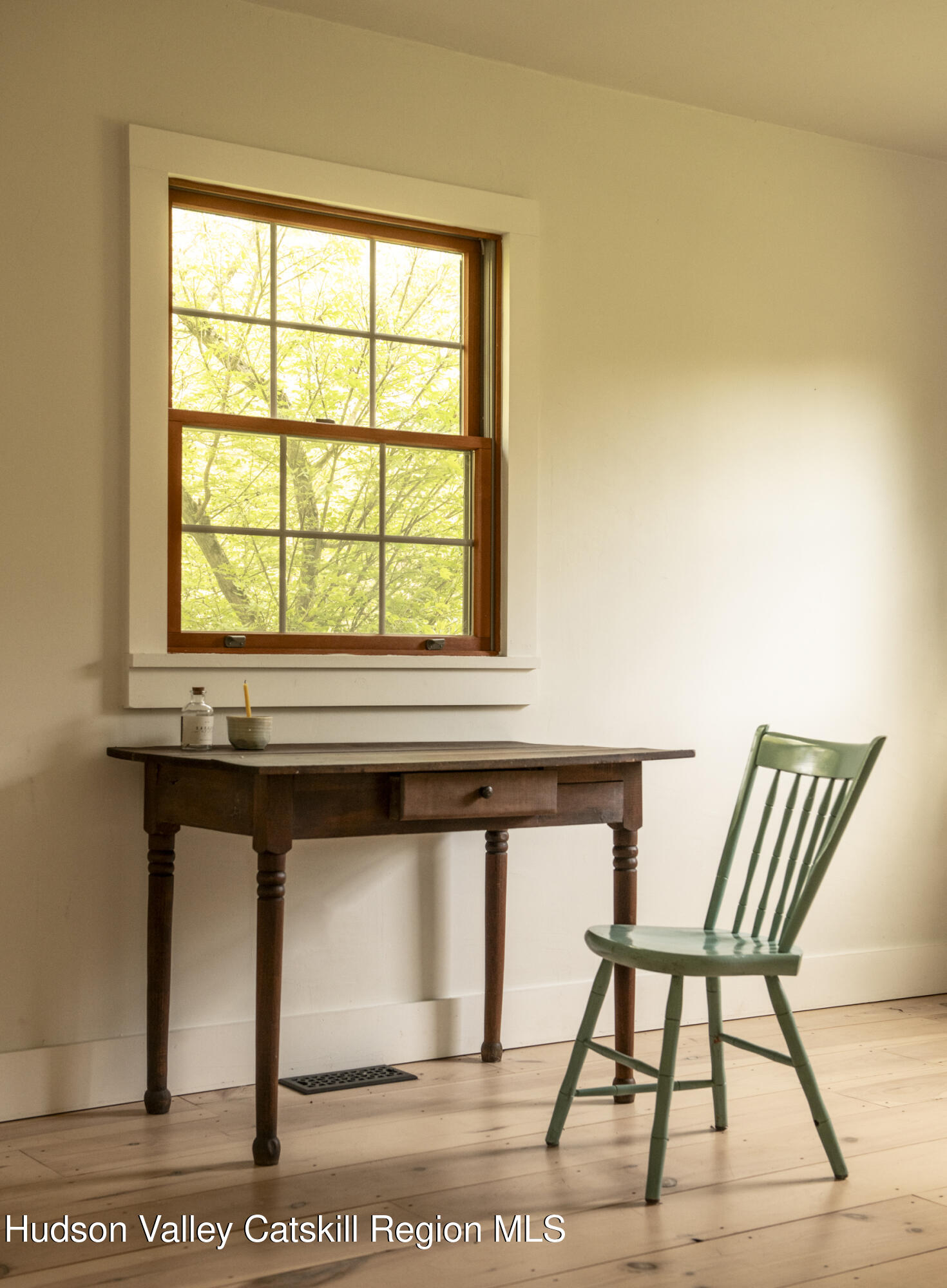 61 Schoolhouse Road New Lebanon, NY 12125 - Photo 7 of 22 a view of a hallway with furniture and window