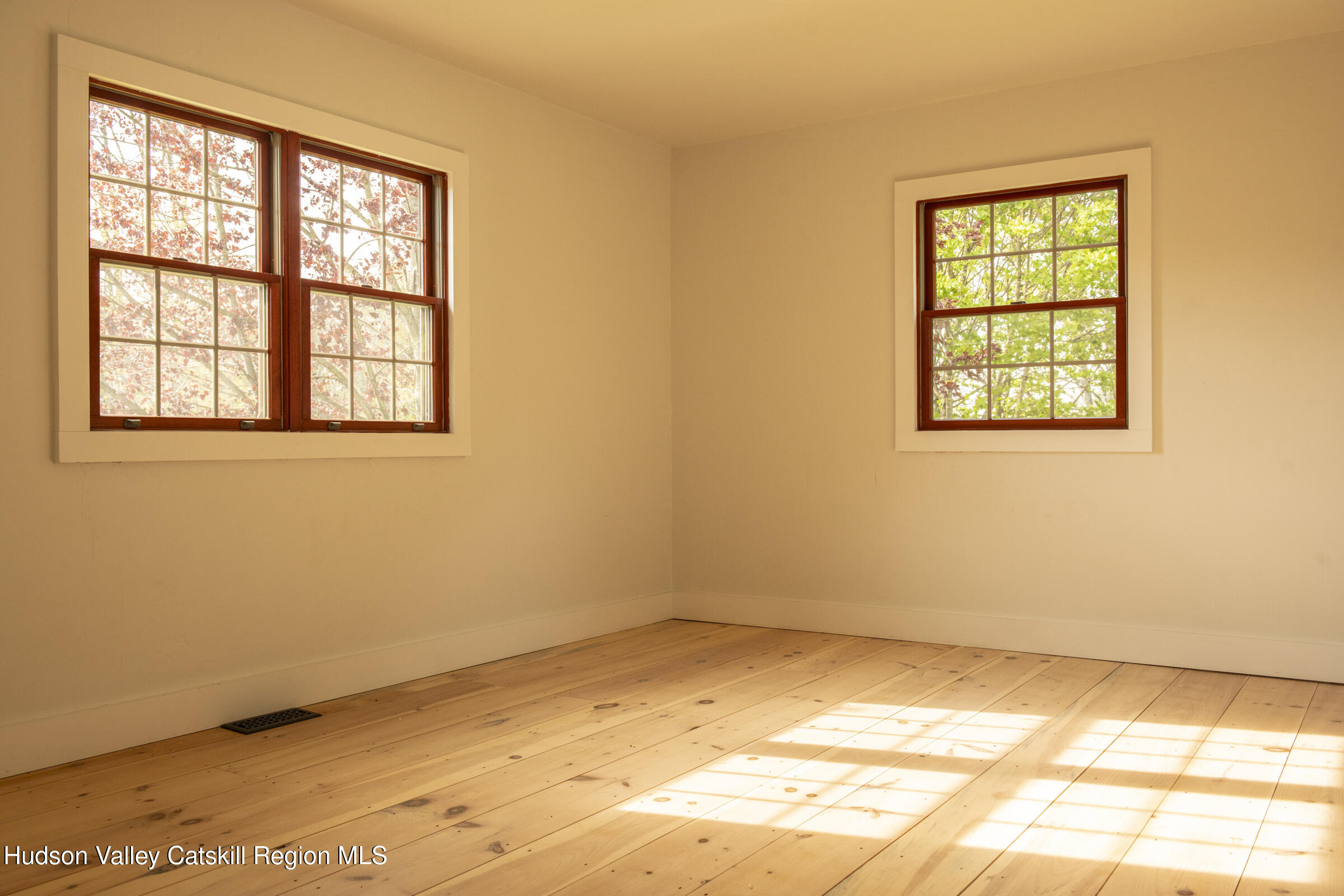 61 Schoolhouse Road New Lebanon, NY 12125 - Photo 8 of 22 an empty room with a window