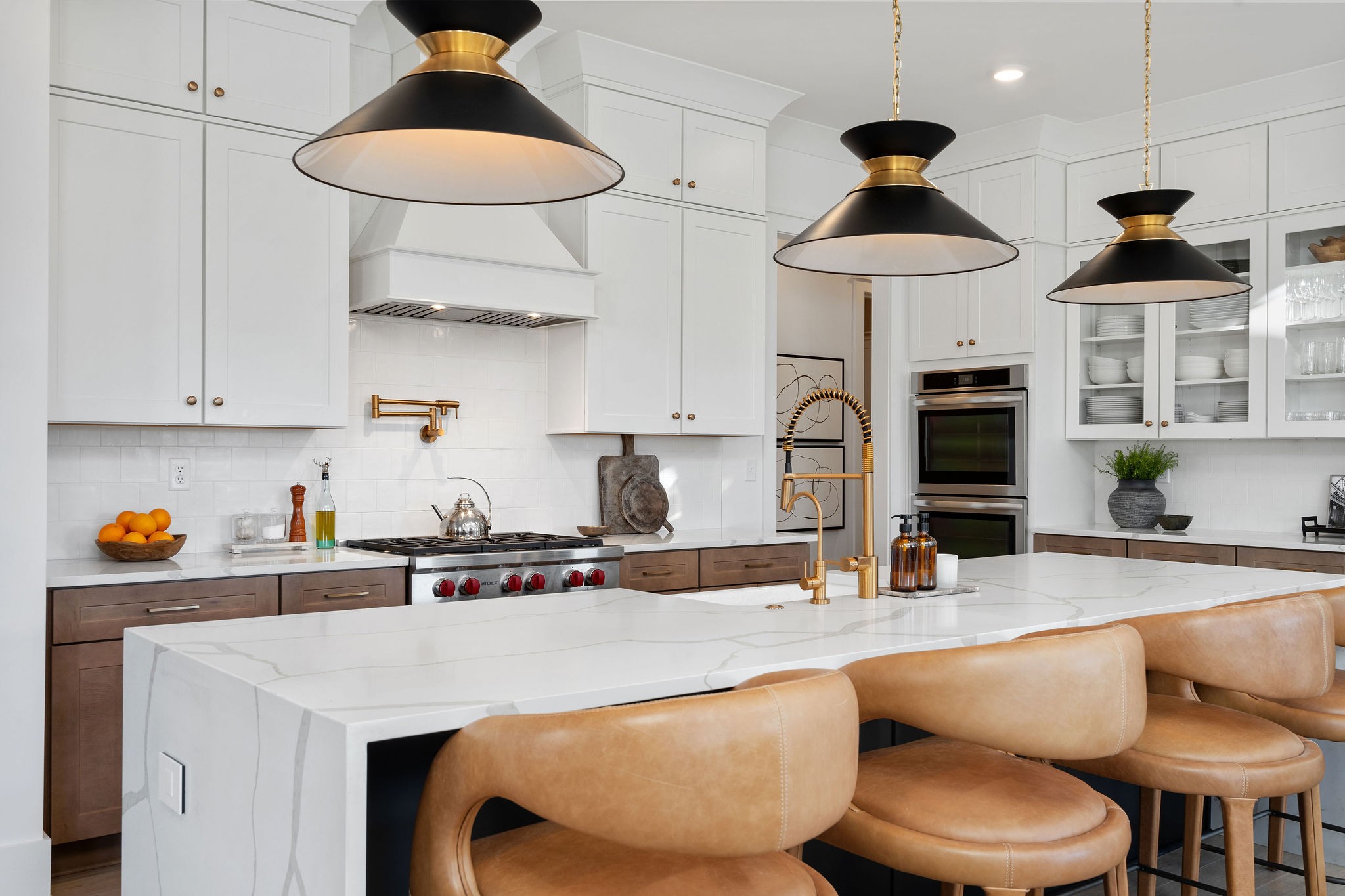 1052 Pine Creek Drive Arrington, TN 37014 - Photo 19 of 54 a kitchen with stainless steel appliances a table and chairs in it