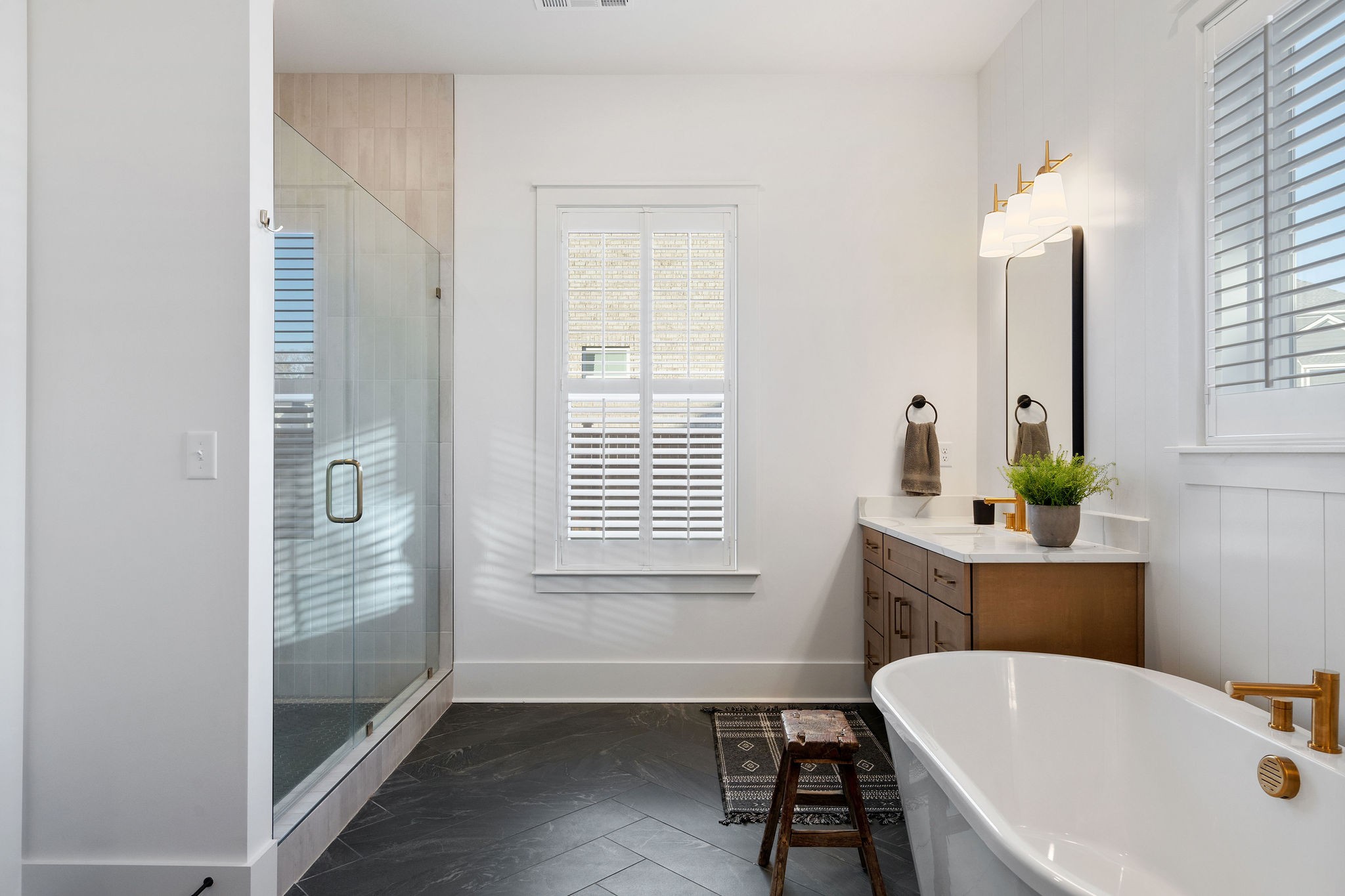1052 Pine Creek Drive Arrington, TN 37014 - Photo 29 of 54 a bathroom with a bathtub a sink and a window