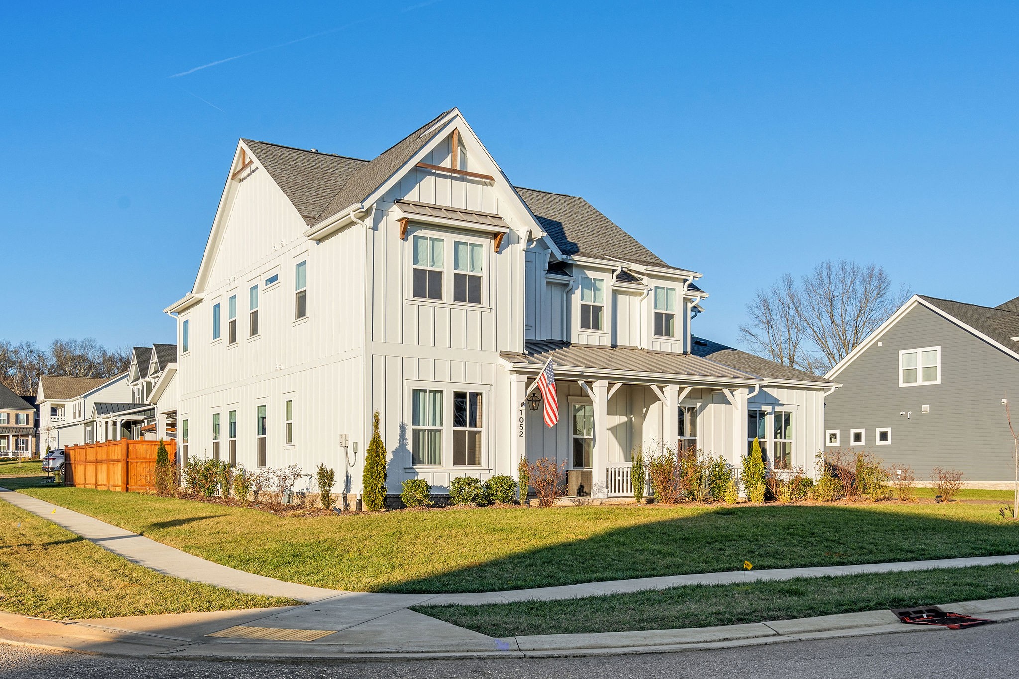 1052 Pine Creek Drive Arrington, TN 37014 - Photo 3 of 54 a view of a big house with a yard and plants