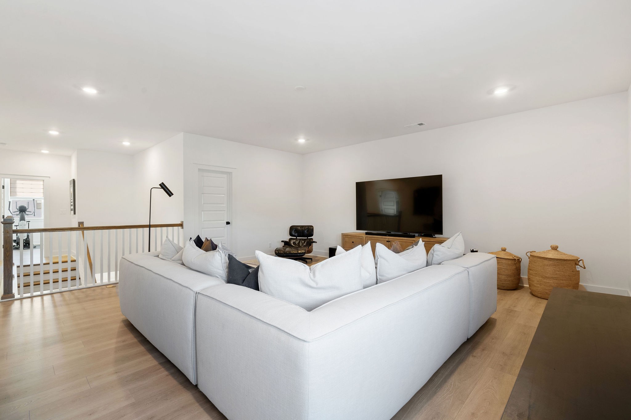 1052 Pine Creek Drive Arrington, TN 37014 - Photo 32 of 54 a living room with furniture and a flat screen tv