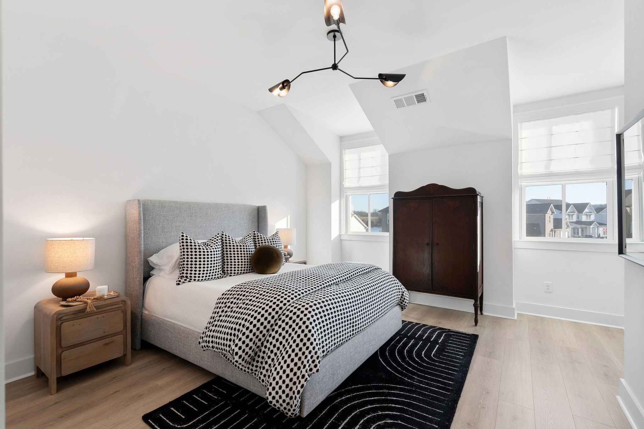 1052 Pine Creek Drive Arrington, TN 37014 - Photo 33 of 54 a bedroom with a bed and wooden floor