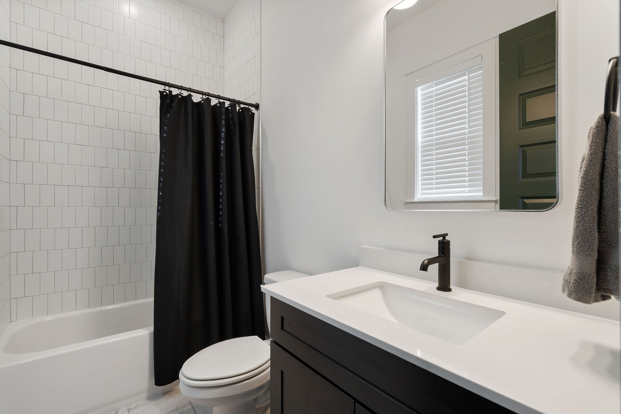 1052 Pine Creek Drive Arrington, TN 37014 - Photo 38 of 54 a bathroom with a sink a toilet a mirror and shower