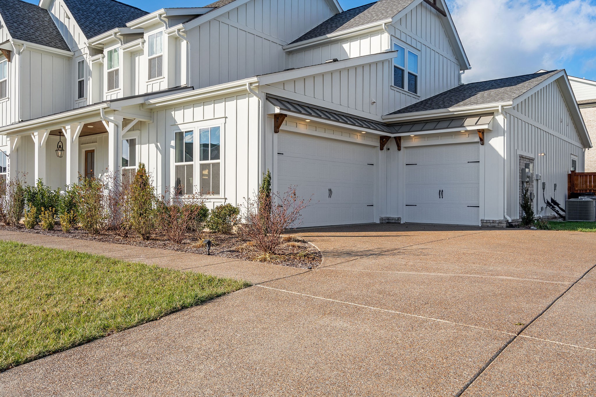 1052 Pine Creek Drive Arrington, TN 37014 - Photo 4 of 54 a front view of a house with garden