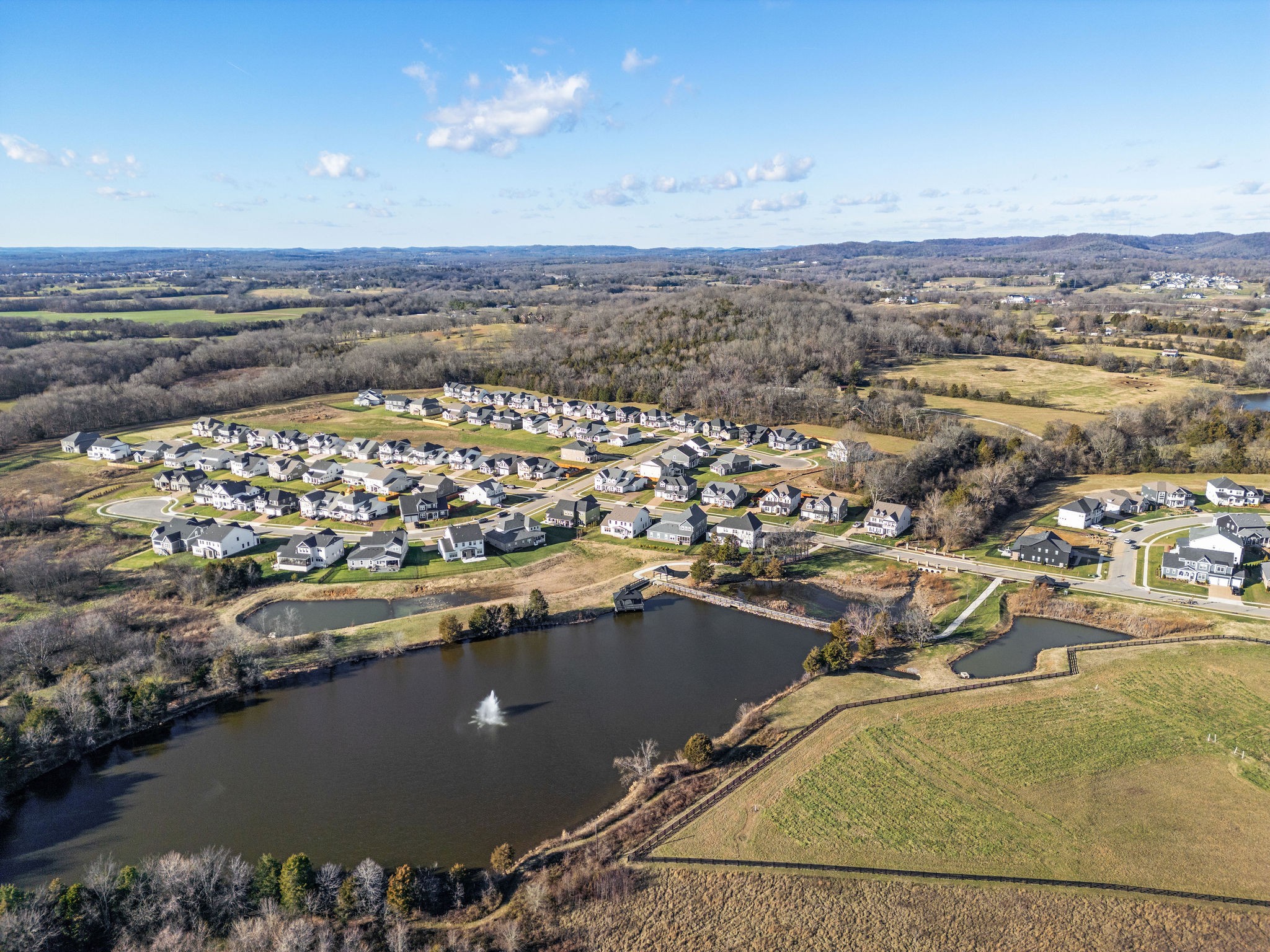 1052 Pine Creek Drive Arrington, TN 37014 - Photo 43 of 54 an aerial view of a house with a lake