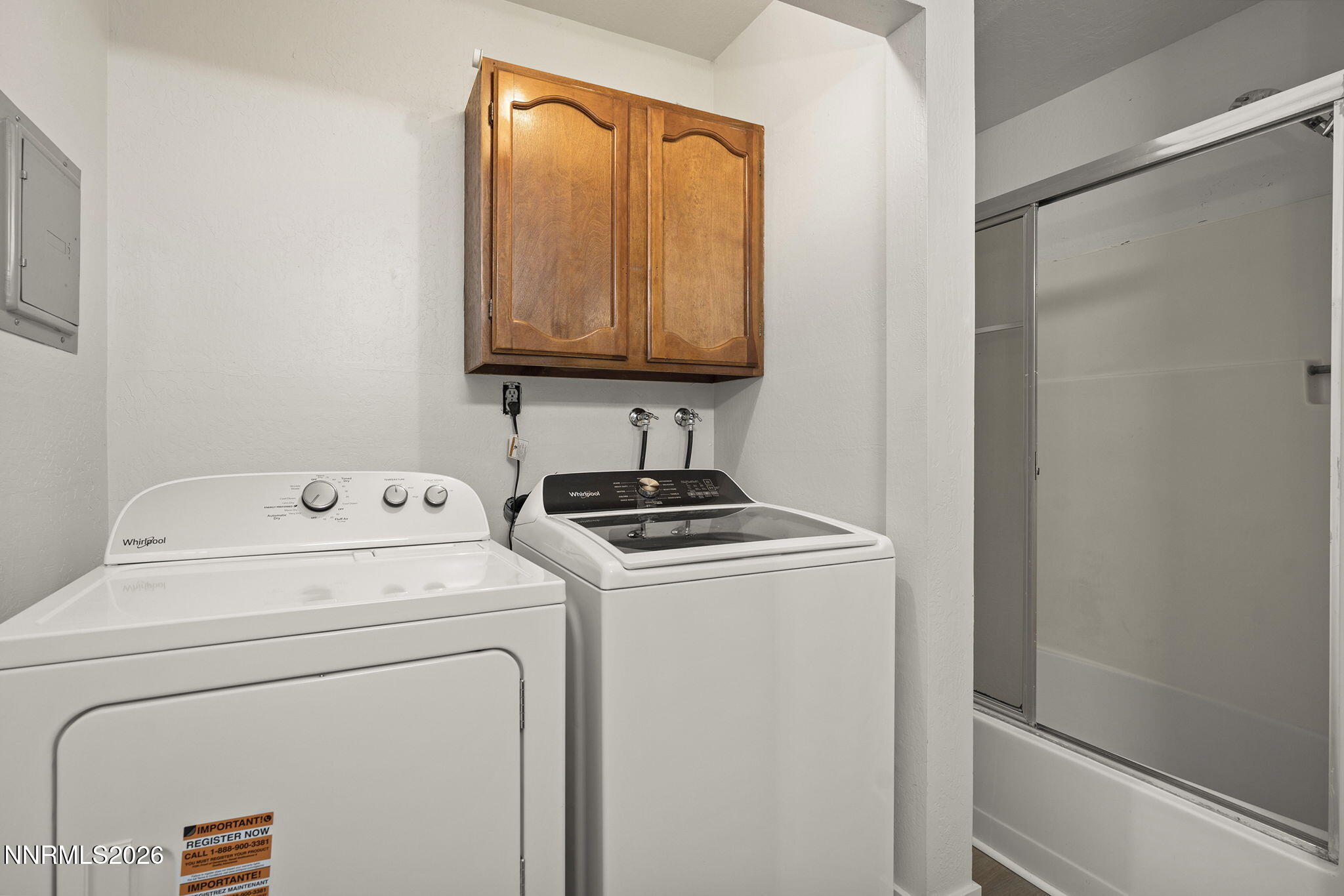 179 Tramway Drive, Unit B Stateline, NV 89449 - Photo 14 of 29 a utility room with dryer and washer