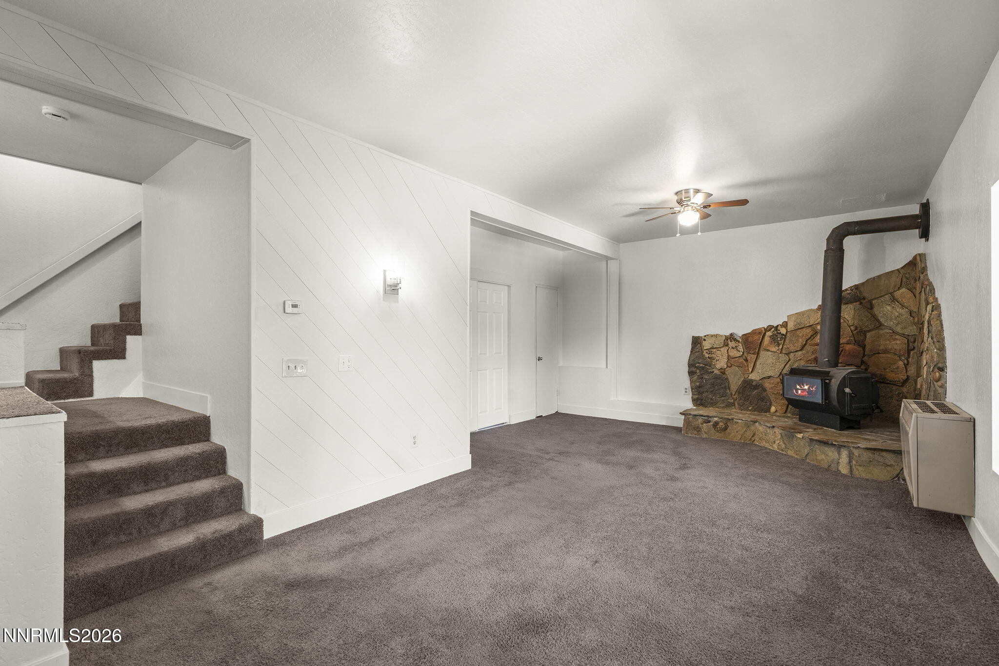 179 Tramway Drive, Unit B Stateline, NV 89449 - Photo 18 of 29 a view of a livingroom with stairs and furniture